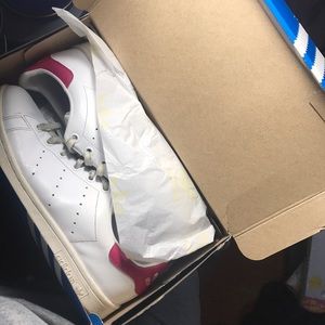 Pink and white adidas Stan Smith